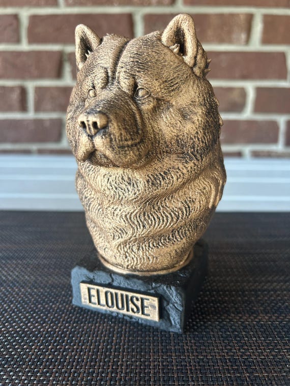 Hand-painted custom dog statue with a personalised name plate