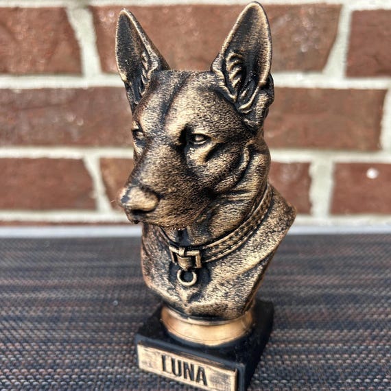 Hand-painted custom dog statue with a personalised name plate