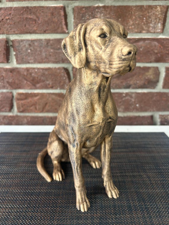 Hand-painted custom dog statue with a personalised name plate
