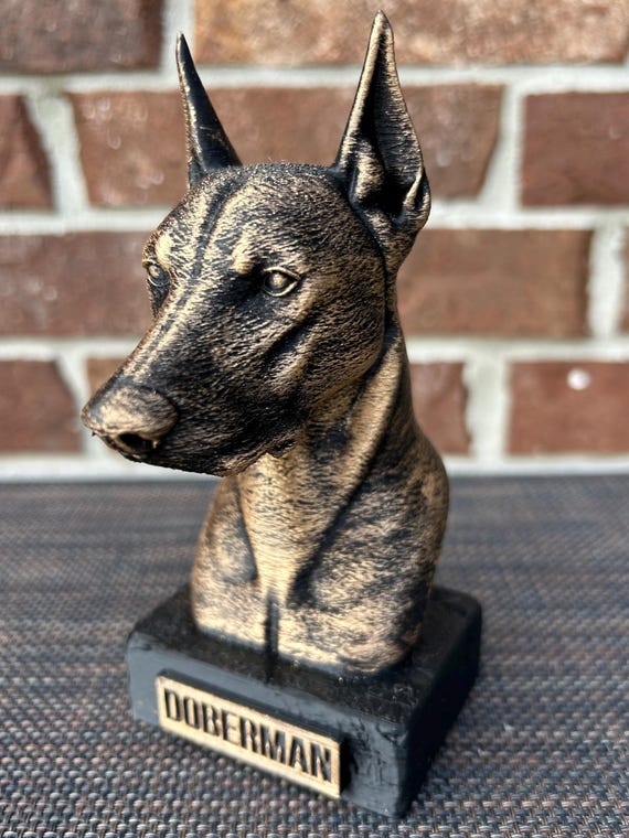 Hand-painted custom dog statue with a personalised name plate