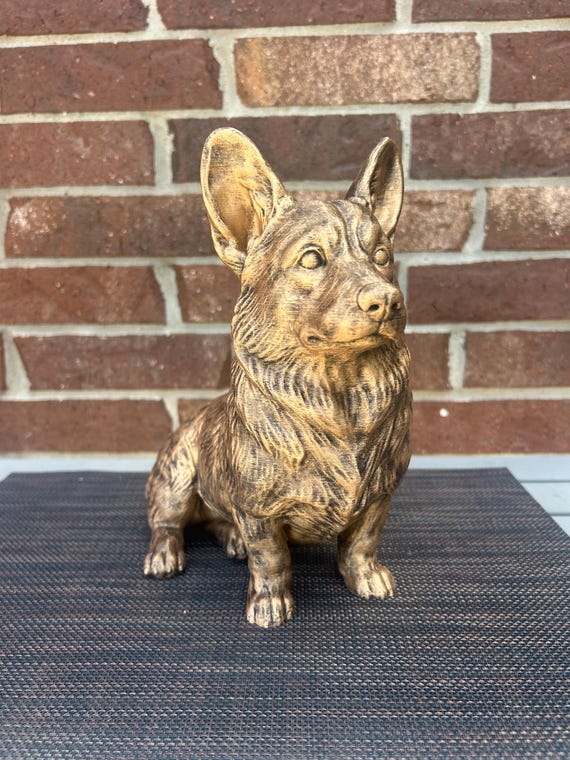 Hand-painted custom dog statue with a personalised name plate