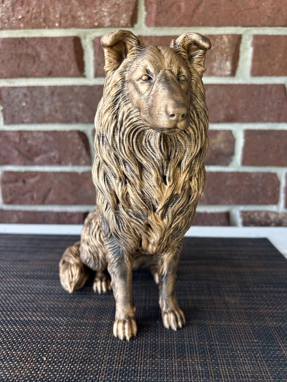 Hand-painted custom dog statue with a personalised name plate