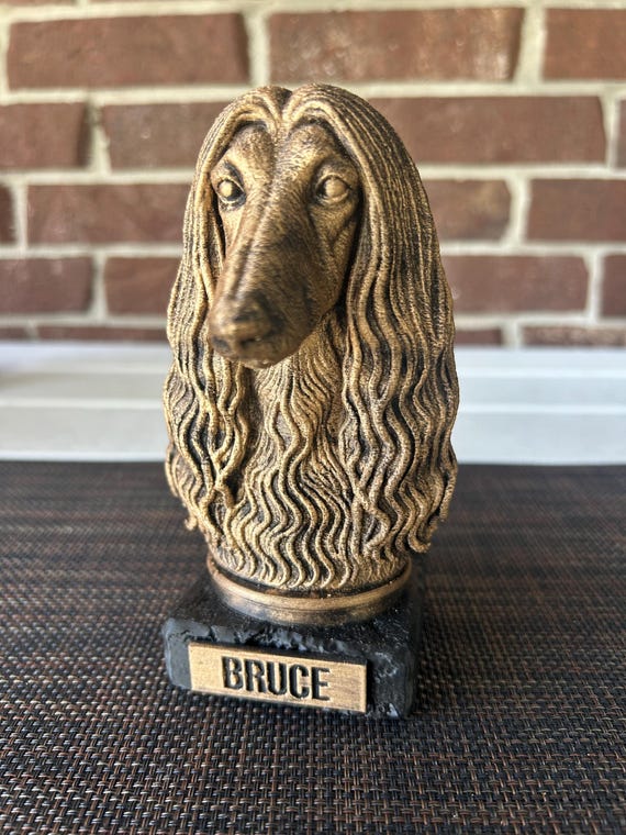 Hand-painted custom dog statue with a personalised name plate