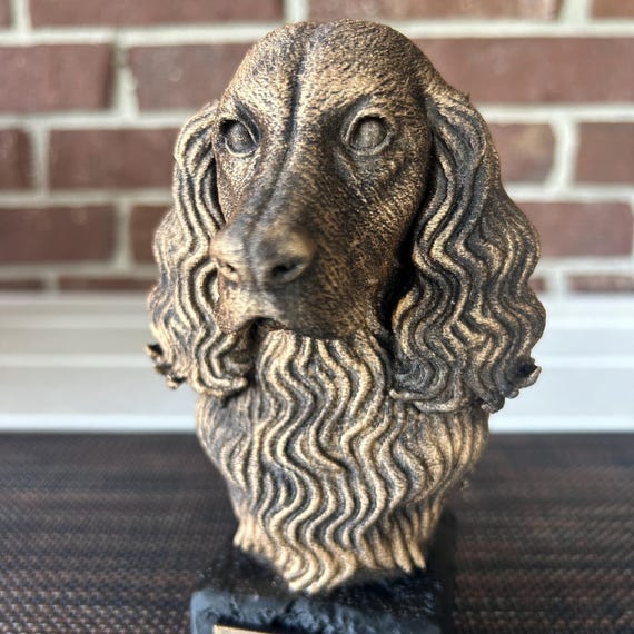 Hand-painted custom dog statue with a personalised name plate