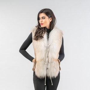 Real fox and mink fur vest in natural colors, with a modern buckle of three laces. Winter fur vest, fur Gillet. Luxury fur gift for women.