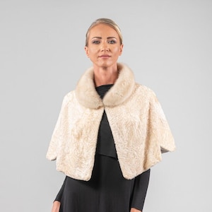 One size real astrakhan fur cape without sleeves in natural pearl color, with mink fur on the lapel. Winter fur cape, women luxury fur gift.