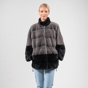 Grey and black One Size mink fur jacket, high-neck collar. Full skin mink fur stroller. Women&#39;s winter clothing. Luxury Christmas fur gift.