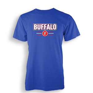 May include: A royal blue t-shirt with a white and red "BUFFALO" logo with a red "B" in a circle.