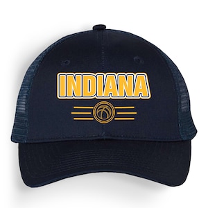 May include: A navy blue trucker hat with a yellow and blue "INDIANA" logo and a basketball graphic.