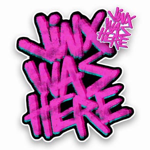 Könnte beinhalten: Ein Aufkleber mit dem Schriftzug "Jinx Was Here" in leuchtend pinkfarbenen Graffiti-Buchstaben, umrandet von Türkis, auf schwarzem Hintergrund. Der Aufkleber hat einen weißen Rand.