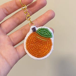 Portachiavi con perline arancioni / Portachiavi con ricamo di perline fatto a mano