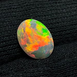 Beautiful Natural Rare Ethiopian Opal Faceted Oval Cut Loose Gemstone 10x14mm Semi Precious Stone Jewelry Making
