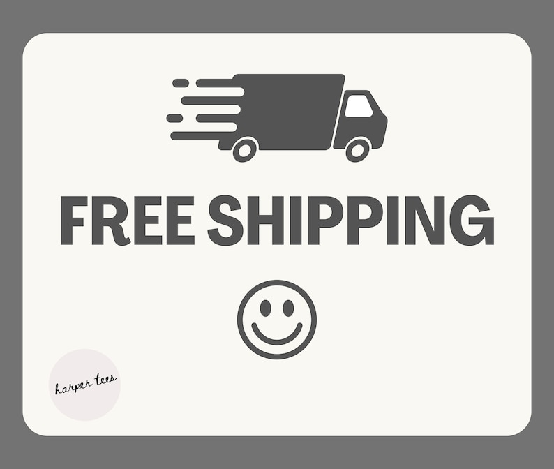 May include: A white sign with a gray truck icon and the text "FREE SHIPPING" in black. A gray smiley face is below the text. The text "harper tees" is in a circle at the bottom left corner of the sign.