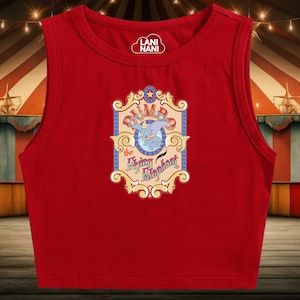 May include: Red sleeveless crop top with a vintage-style graphic of Dumbo the Flying Elephant. The graphic features a blue and yellow color scheme and the text "Dumbo the Flying Elephant".