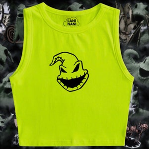 May include: A neon green sleeveless crop top with a black graphic of the Oogie Boogie character from The Nightmare Before Christmas. The text "LANI NANI" is printed on the top.