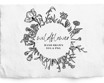 May include: Black and white line art illustration of a wreath of wildflowers. The text "wildflower" is written in cursive inside the wreath. The text "HAND DRAWN SVG & PNG" is written below the wreath.