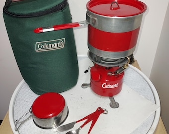 Coleman peak1, model 400 stove, custom red powdercoat, cook kit and padded case. For emergencies or camping in style.