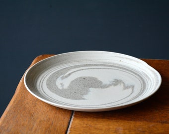 White stoneware plates and recycled granite inclusion