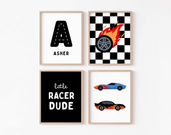 May include: Four framed wall art prints featuring racing themes. One shows a letter A shaped like a road with the name ASHER. Another has a checkered background with a flaming tire. One says little RACER DUDE. The last shows two race cars with flames.