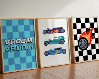 May include: Three framed wall art prints. The left print features a blue checkered pattern with the text VROOM VROOM. The center print displays three hot rod cars in purple, teal, and blue. The right print shows a black and white checkered flag.