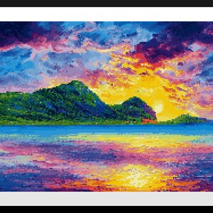 May include: A framed cross-stitch landscape depicting a sunset over a tropical island. The sky transitions from deep purple to vibrant orange and yellow, reflecting in the water. Lush green mountains and a small island are in the center.