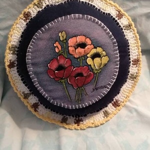 California Poppies painted applique on denim with blue backing and yellow and white crocheted trim.