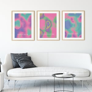 May include: Three framed posters with colorful abstract backgrounds and white text. The text on the posters reads "Be what you trust most", "Let's be our own light shine", and "Protect your energy".