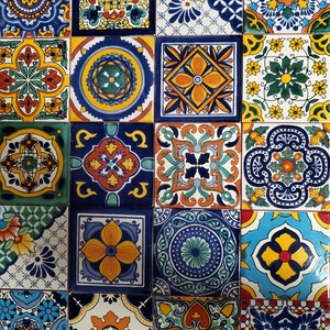 May include: A collection of colourful ceramic tiles with intricate geometric patterns. The tiles feature a variety of colours, including blue, green, yellow, orange, and red. The tiles are arranged in a grid pattern, creating a visually appealing design.
