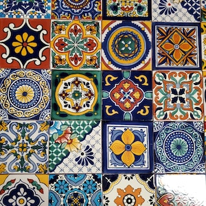 May include: A collection of colourful, square, ceramic tiles with intricate geometric patterns in shades of blue, yellow, green, red, and white.