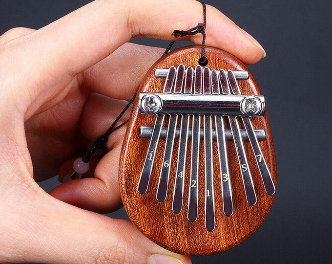 Mini 8 Keys Kalimba Thumb Piano Finger Percussion Pocket Musical