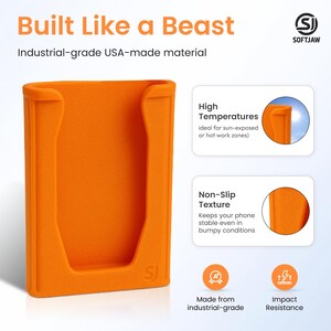 K&ouml;nnte beinhalten: Orangener Telefonhalter mit dem Text "Built Like a Beast" und "Industrial-grade USA-made material." Er ist hitzebest&auml;ndig und hat eine rutschfeste Textur.