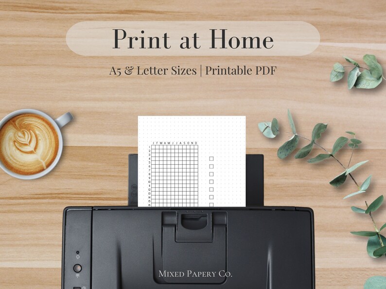 May include: A black and white printable planner sheet with a grid layout and checkboxes. The sheet is being fed into a black printer. The text "Print at Home" and "A5 & Letter Sizes | Printable PDF" is displayed above the printer. The text "MIXED PAPERY CO." is displayed below the printer.