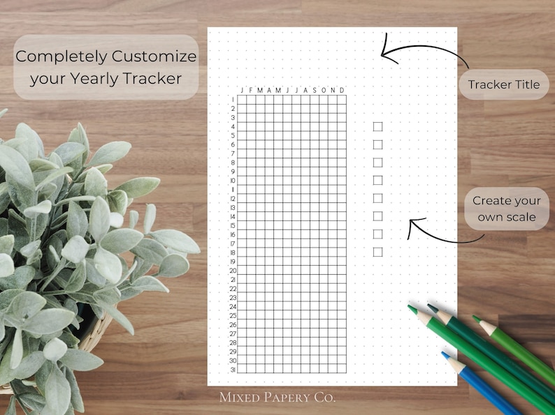 May include: A black and white printable yearly tracker with a grid of squares for each month of the year. The tracker has a dotted background and a space for a title and a scale.