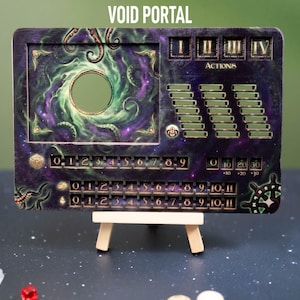 May include: A rectangular game board with the text "VOID PORTAL" at the top. The board features a central circular opening and various numerical indicators. The color scheme includes purple, green, and gold accents. It is propped up on a small wooden easel.