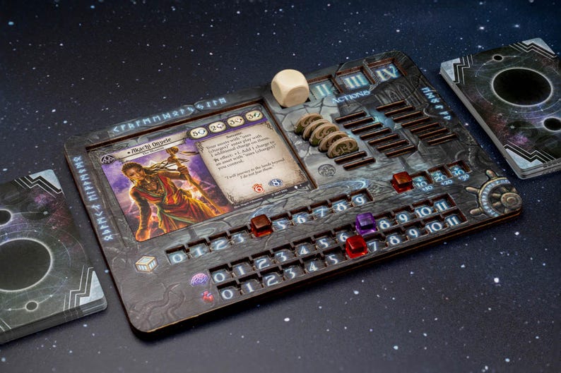 May include: A detailed board game setup featuring a wooden game board with slots for cards, dice, and tokens. The board has etched designs and numbers. A card with a character illustration is visible, along with a stack of cards and a die.