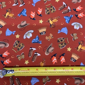Saddle up Red by the 1/2 yard. Vintage western print from Michael Miller