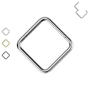 May include: A square-shaped, chrome-plated towel ring. The ring is made of metal and has a smooth, polished finish.