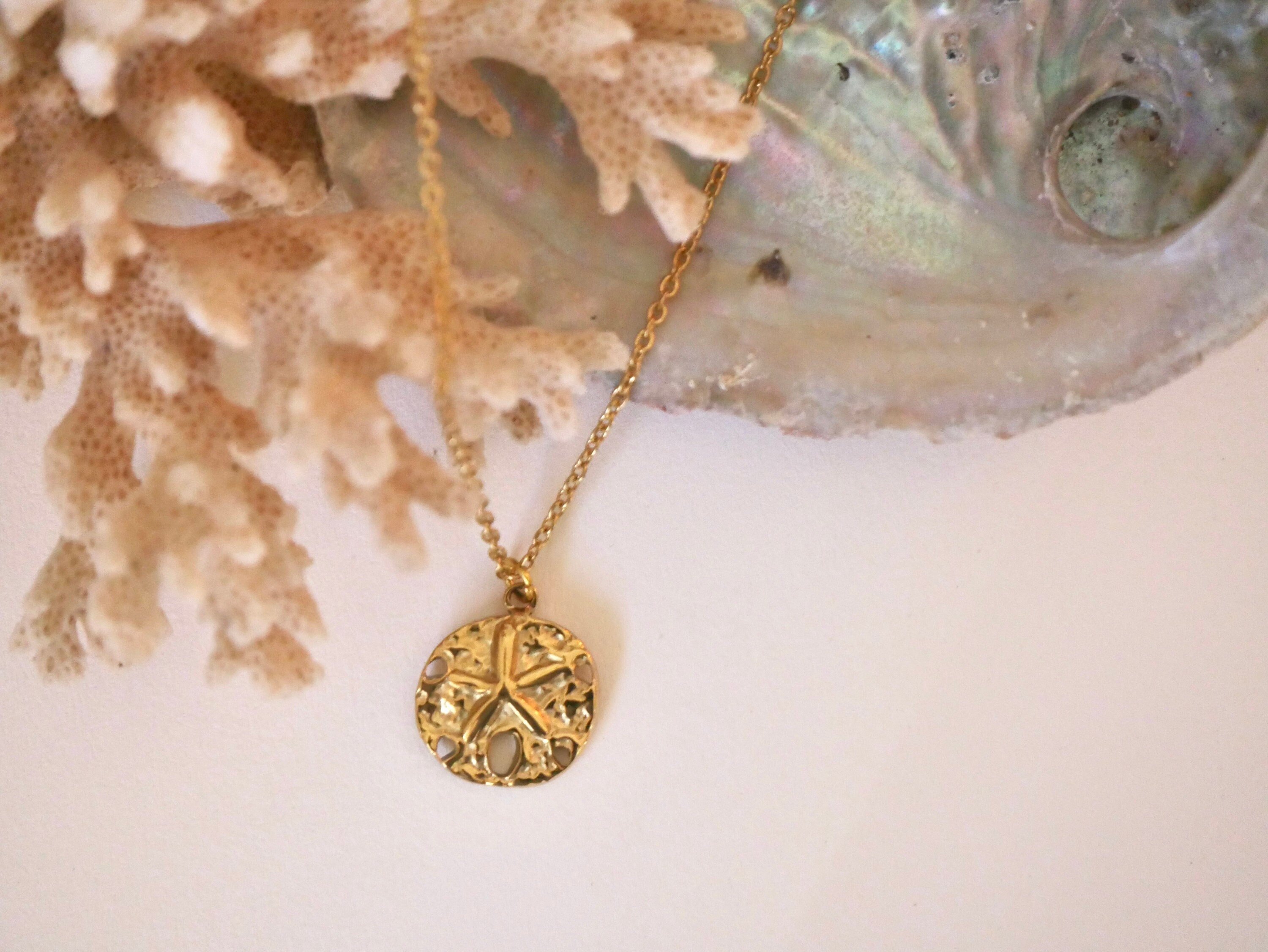 Gold sand sale dollar pendant