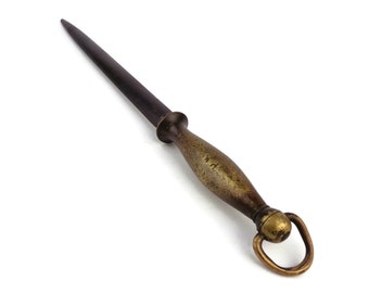 Afilador de cuchillos de carnicero antiguo
