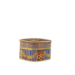 May include: A small, square, decorative box with a gold lid and blue, purple, red, and gold enamel designs. The box has a geometric pattern on the top and a floral design on the sides.