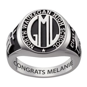 May include: A silver class ring with a black enamel center featuring the initials "GML" and the text "North Waukegan High School" around the edge. The ring also has the text "Class of" and a star on the top. The bottom of the ring has the text "Congrats Melanie".