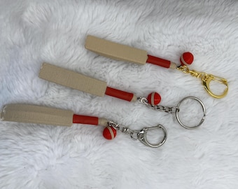 Mini Cricket Bat Keychain: Rare Red Sports Accessory