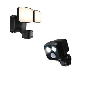 May include: Two black outdoor security lights. One has two rectangular light panels and a motion sensor. The other has two round lights and a motion sensor. Both are mounted on a white background.