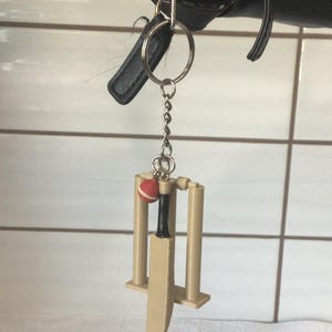 Unique Cricket Mini Game Keychain – Rare Sports Accessory & Gift for Cricket Lovers – Mini Cricket Gear Charm