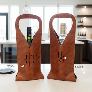 Personalized leather wine tote bags with custom initials, perfect as a wedding gift and anniversary gift. Elegant engraved design fits wine or champagne bottles, ideal for couples and celebrations