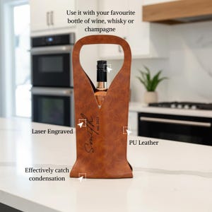 Personalized leather wine tote bag, laser engraved with custom text, made from durable PU leather. Fits wine, whisky, or champagne bottles and effectively catches condensation – unique gift for anniversaries, weddings, and housewarmings