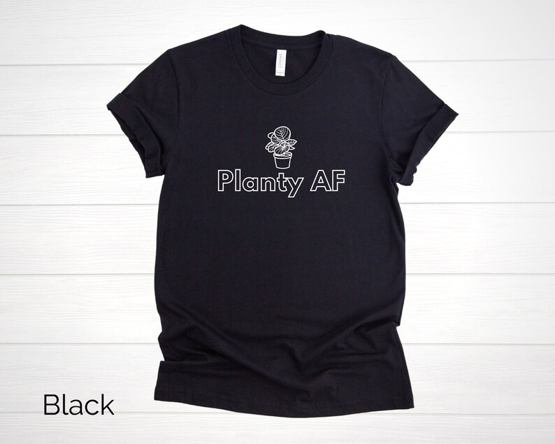 May include: Black t-shirt with a white outline of a potted plant and the text "Planty AF".