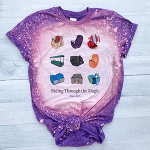 ディズニーの乗り物シャツ、ページング・モローのクロップTシャツ、ピーターパンのシャツ、グラフィックTシャツ、ブリーチされたエプコットのアトラクションカート、アトラクションのクロップタンク