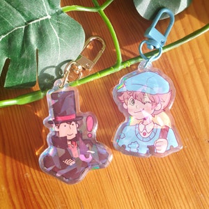 2" Layton & Luke epoxy holographic keychains