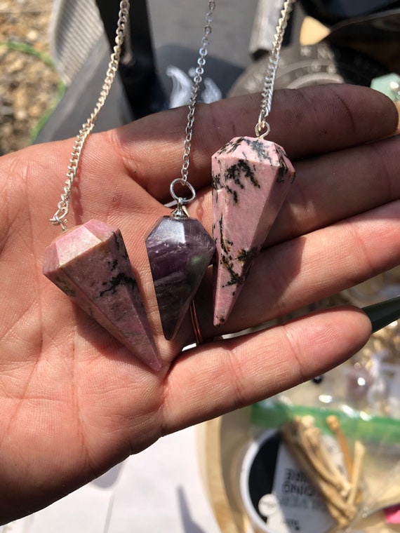 Rhodonite crystal pendulum divination